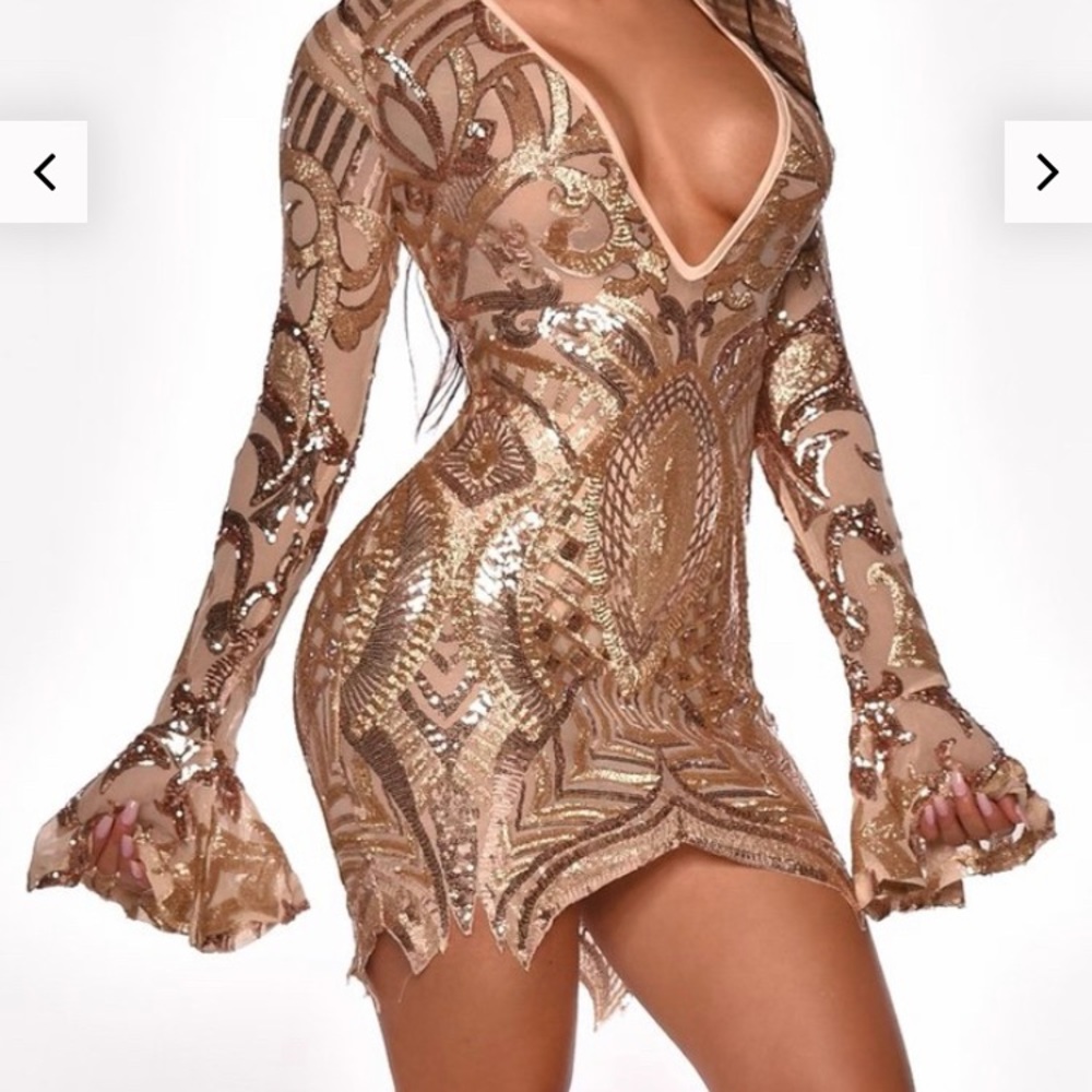 Mini gold sequence dress.